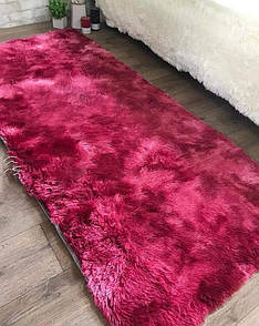 Хутровий килимок на підлогу червоного кольору