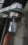 Механічний затискач-перехідник із втулки 76 на 150 мм для безвальних розмоток, фото 2