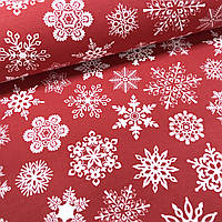 Водоотталкивающая ткань Duck новогодняя, белые снежинки на красном