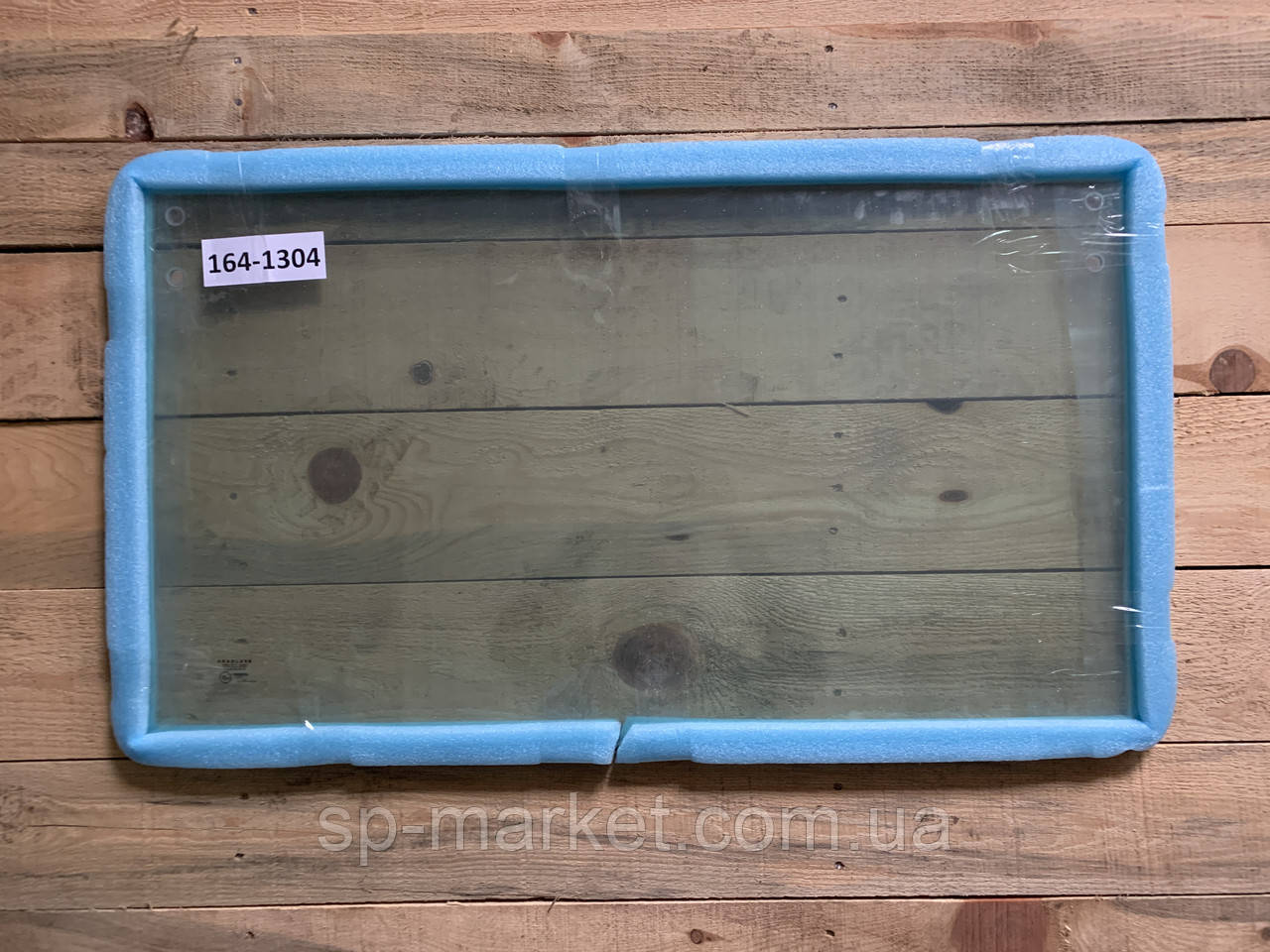 Скло заднє спіднє CAT 428C 164-1304 Caterpillar, фото 1