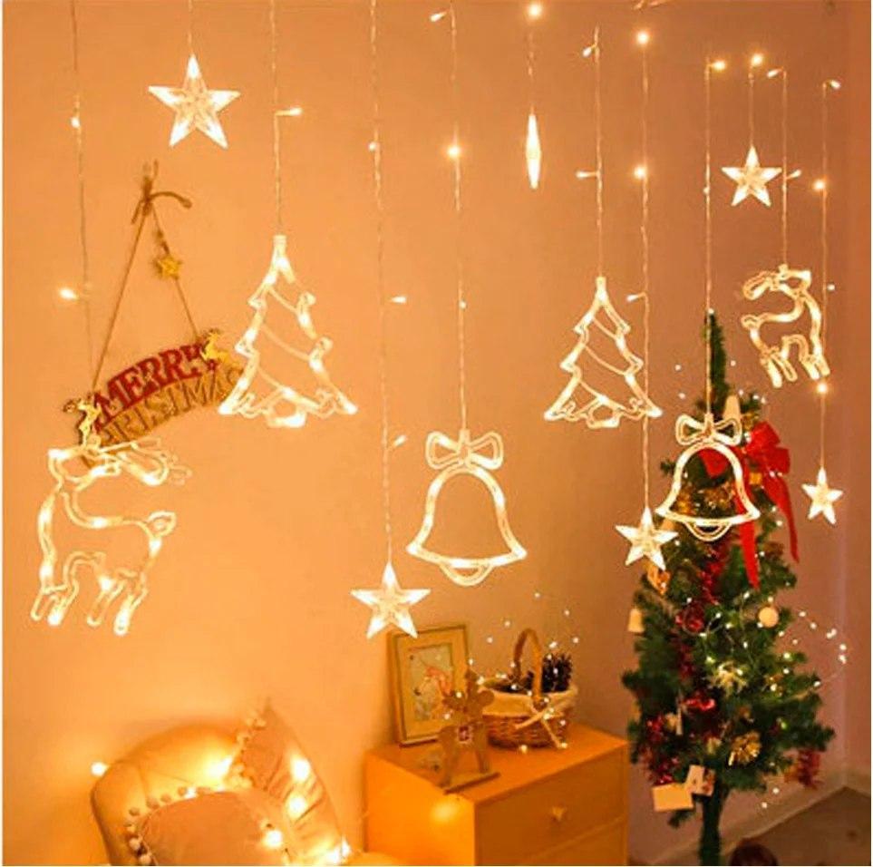Світлодіодна гірлянда штора з формами дзвіночок, ялинка, олень 12 PCS light