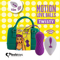 Вагінальні кульки з масажем та вібрацією FeelzToys Motion Love Balls Twisty з пультом ДК, 7 режимів Фіолетовий ( SO3853 )