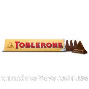 Молочний шоколад Toblerione з медом, мигдалем, нугою 360 gr