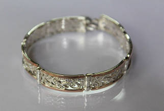 Серебряный браслет со вставками из золота