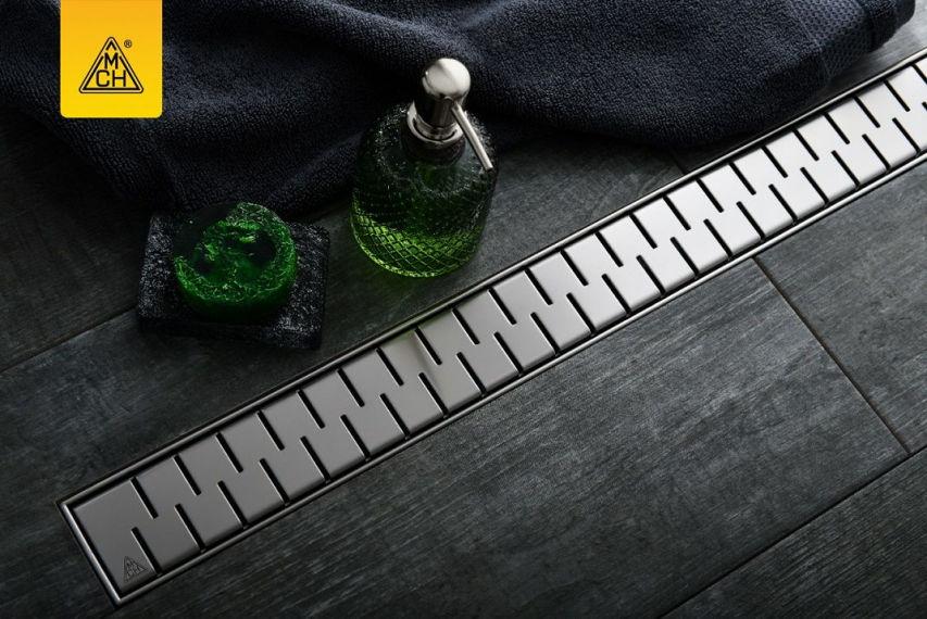 Душовий канал МСН з горизонтальним зливом DN50 і гратами Медіум 950 мм