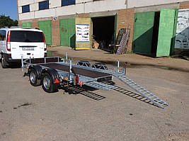 Причіп для перевезення квадроциклів.