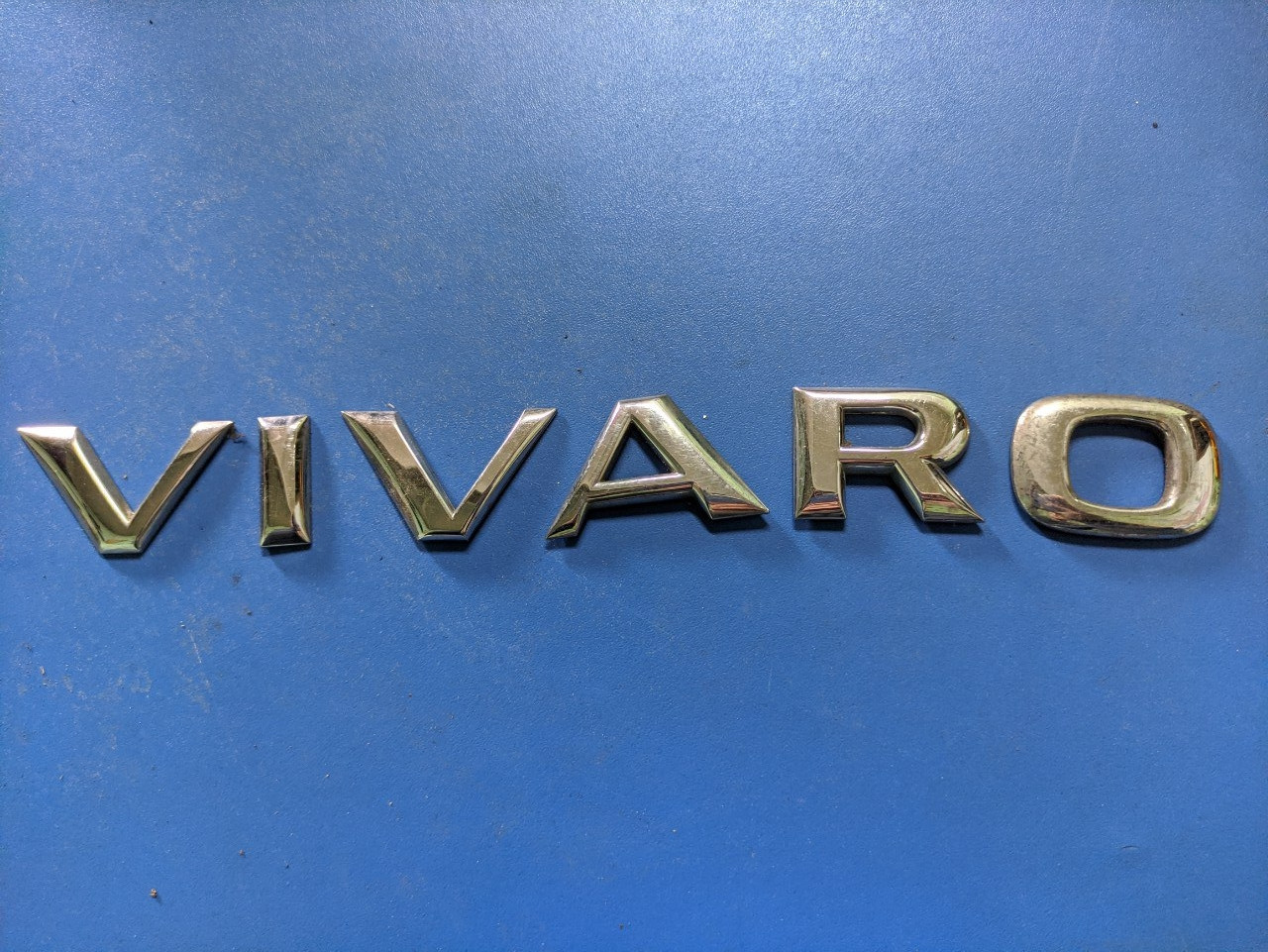 Букви "VIVARO" Opel Vivaro 2001-2014, 93858039 (Б/У)
