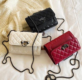 Стьобана сумка клатч на ланцюжку