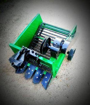 КАРТОПЛЕКОПАЛКА ТРАНСПОРТЕРНА (ЛАНЦЮГОВА) МОТОБЛОКА (ПОСИЛЕНИЙ МЕХАНІЗМ, пасовий привід)