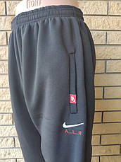 Спортивні штани утеплені на флісі трикотажні великих розмірів із широкою штаниною на високий зріст NIKE, фото 4