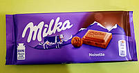Шоколад Milka з горіховим кремом молочний 100 г, фото 6