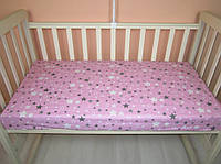 Простынь на резинке в детскую кроватку розовая в звездочки 60 х 120 см