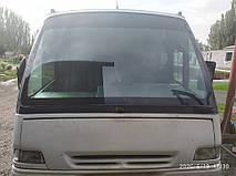 Производство и замена лобового стекла триплекс на автобусе UNVI Xeito на шасси IVECO TurboDaily 59E12 в Никополе (Украина). 13