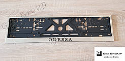 Рамка номерного знаку з написом "Odessa"