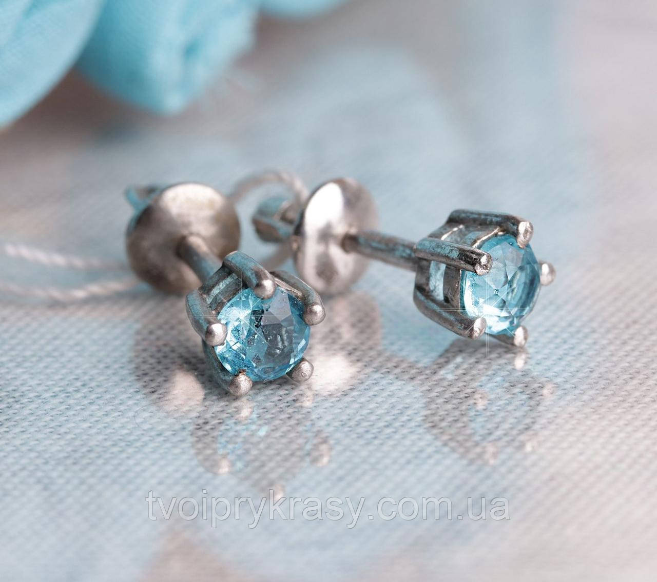 Серьги серебряные, родированые с фионитами.