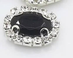 Камінь в сріблястій оправі 2*1,5 см чорний