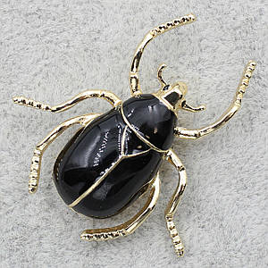 Брошка металева золотиста у формі комахи покрита чорною емаллю розмір виробу 35х38 мм