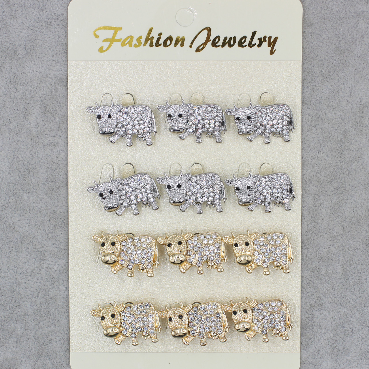 Брошка металічна золотиста та срібляста Корова зі стразами в пакованні 12 штук розмір виробу 26х18 мм