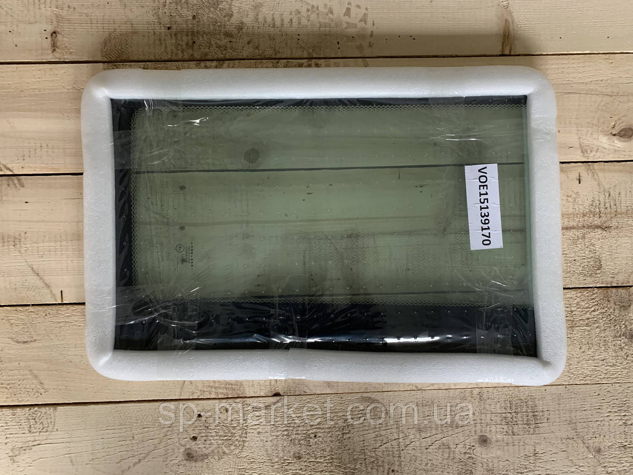 Скло переднє нижнє праве Volvo BL71 VOE15139170