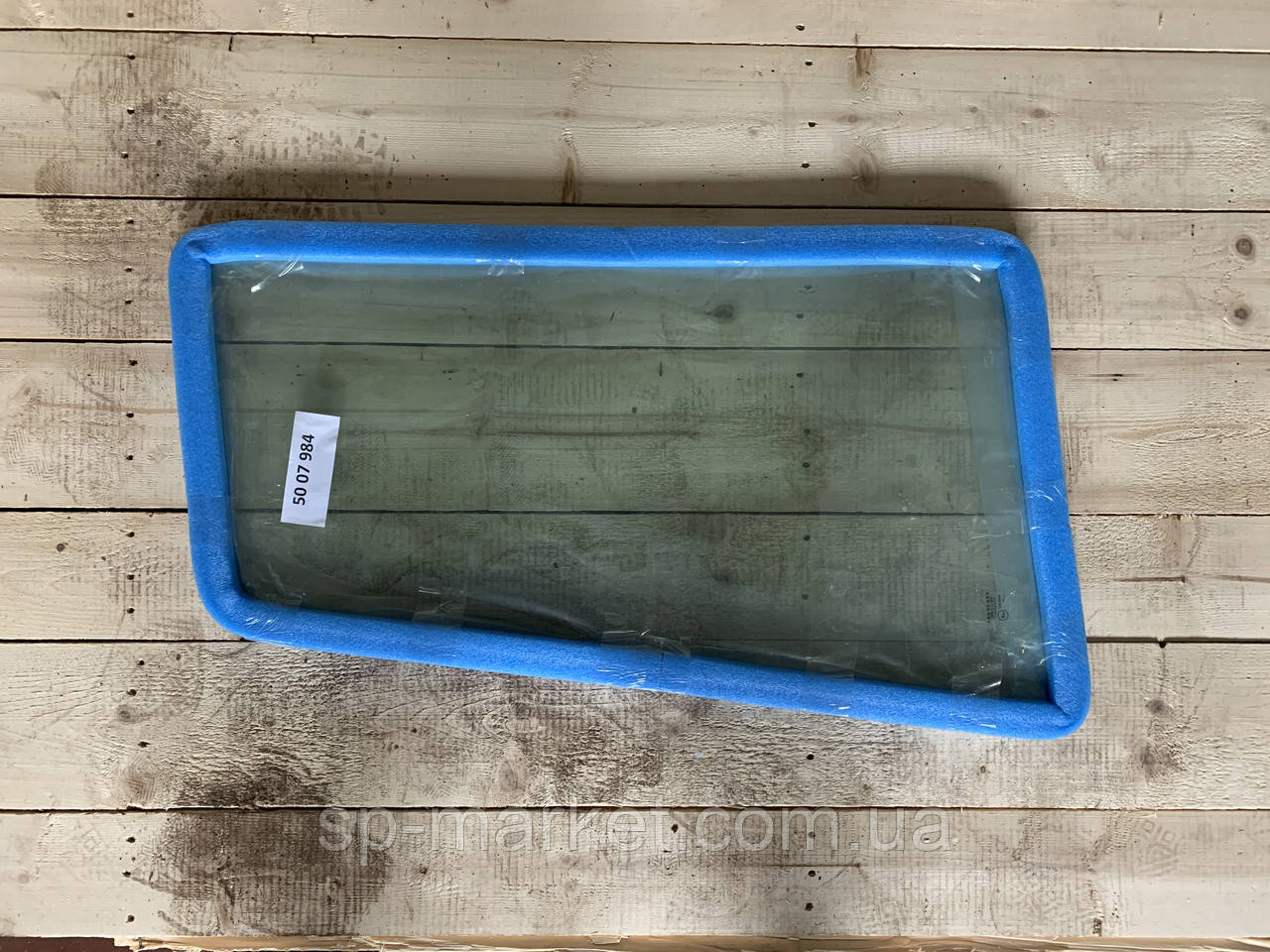 Скло дверцят заднє Liebherr 900, 904, 932 5007984 Скло для спецтехніки LIEBHERR, фото 1