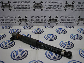 Задній лівий амортизатор Volkswagen Passat B7 USA (561512011)