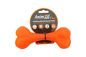 Іграшка для собак AnimAll Кістка люмінесцентна з ароматом ванілі 25см Помаранчева