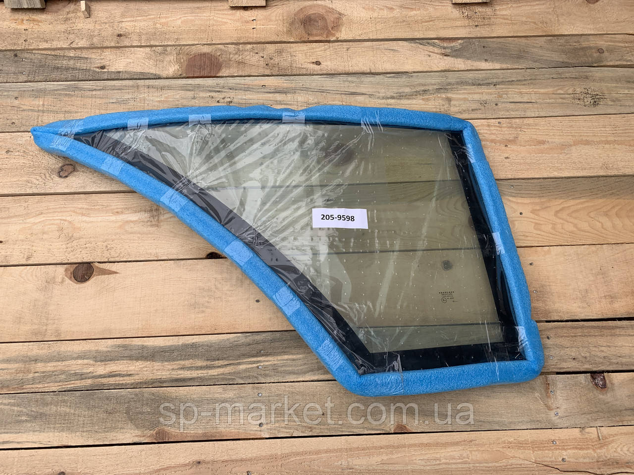 Скло правих дверей CAT 428E 205-9598 для екскаватора-навантажувача Caterpillar, фото 1