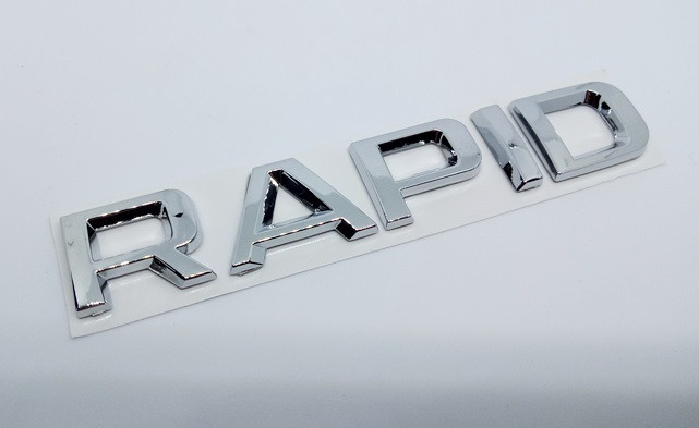 Шильдетик напис Rapid на кришку багажника Skoda