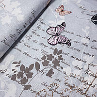 Бязь з метеликами, пір'їнками, написами і гілочками на сірому, ш. 220 см