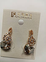 Сережки-гвоздики "Focuris" з фіанітами у формі скрипкового ключа з медичного золота - 120грн.