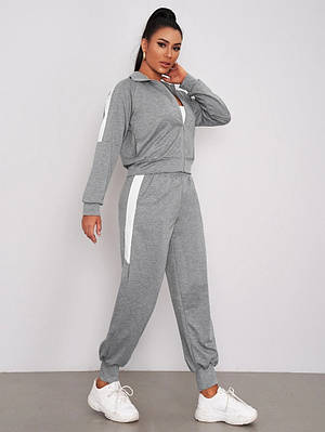 Крутий жіночий повсякденний комстюм з лампасами