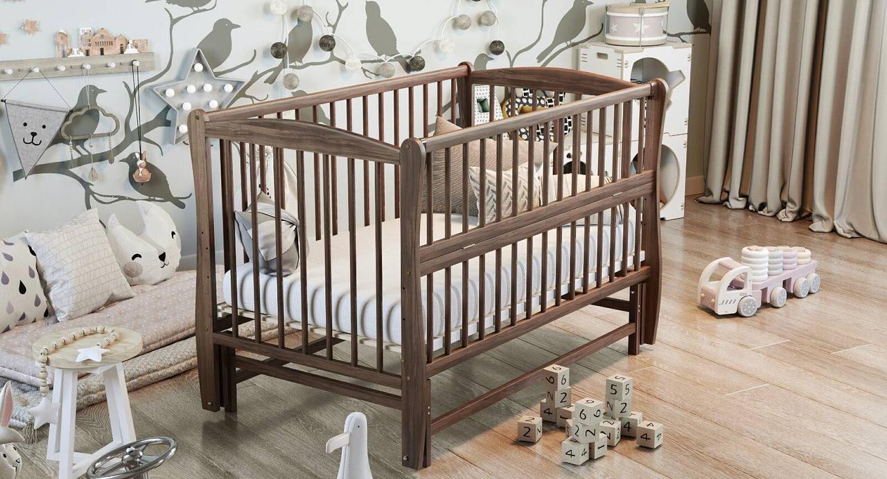 Дитяче ліжечко Дубик-М"Еліт " різьба горіх з відк.боковинкою .