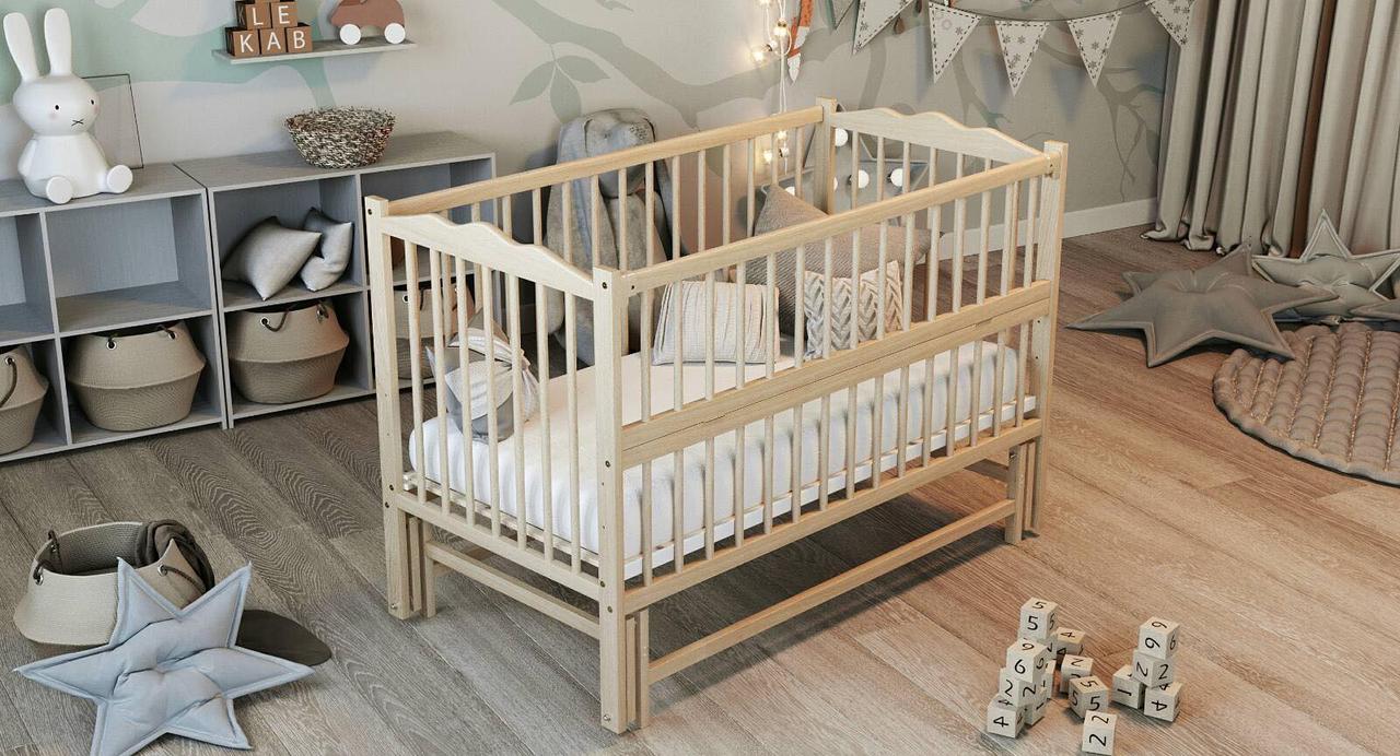 Дитяче ліжечко Дубик-М "Веселка " з відк.боковинкою,натур.на маятнику