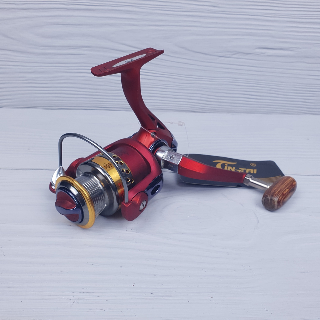 Спінінгова котушка для ультралайта, мікроджига безінерційна Jin Tai XR1000F