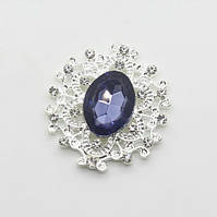 Камінь в сріблястій ажурній оправі 24*26 мм темно-синій