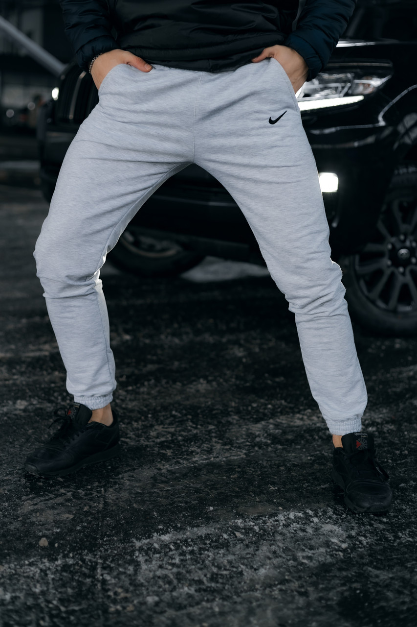 Спортивні штани чоловічі весняні осінні Nike Найк світло-сірі Брюки трикотажні легкі