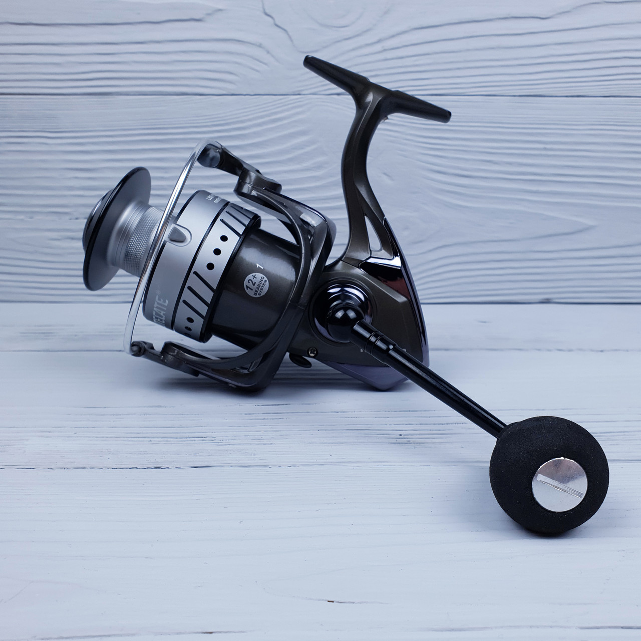 Надійна спінінгова котушка 3000 на хижака Utecate Iveco, фото 1