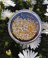 Металеві бульйонки різного розміру в баночці