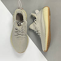 Кросівки сірі