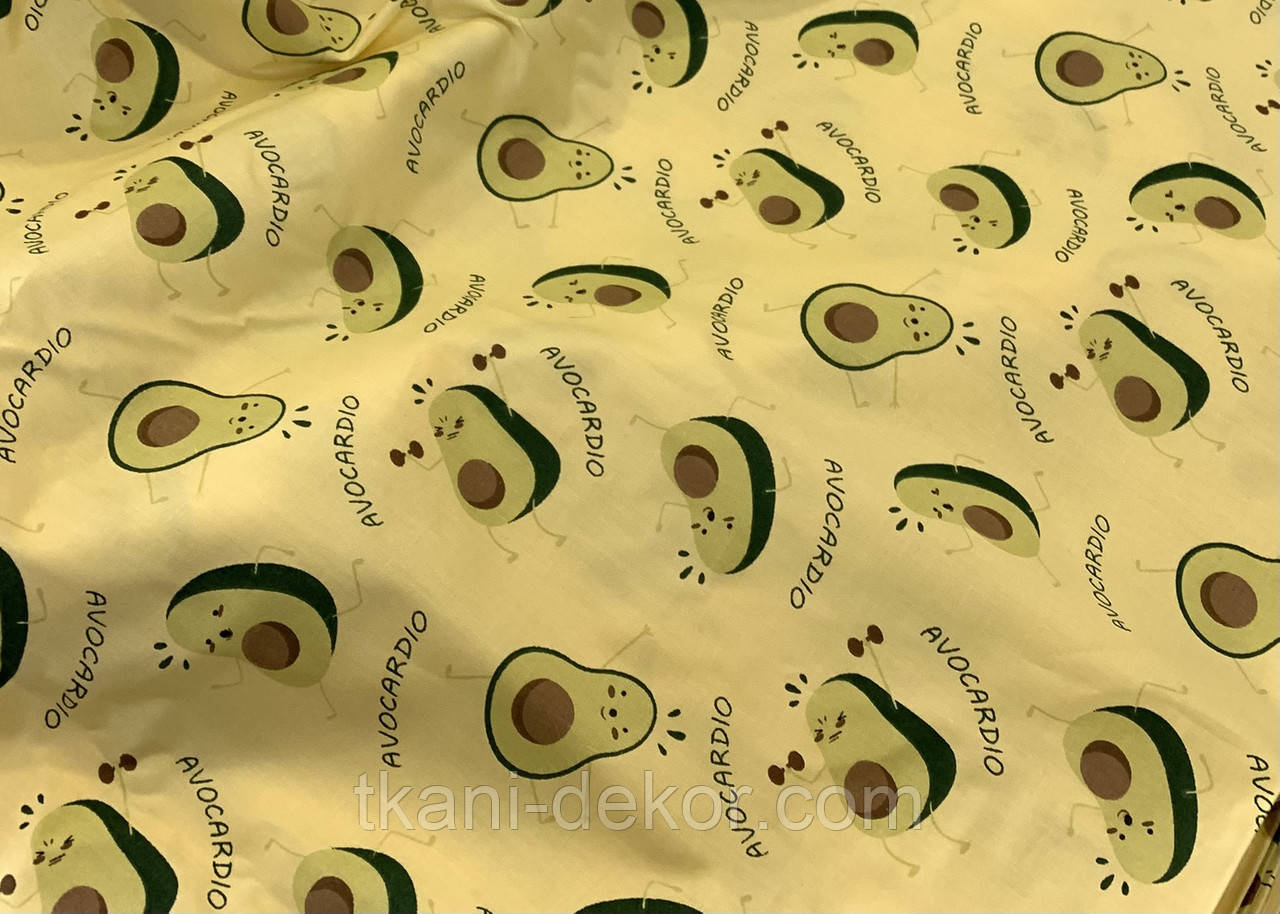 Сатин (бавовняна тканина) авокадо з оченятами на жовтому