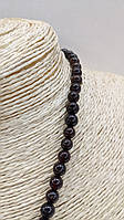 Кольє з чорних перлів.