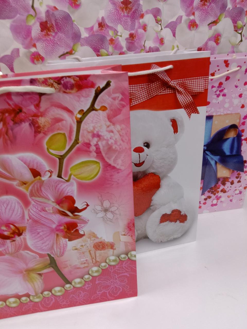 Подарунковий пакет паперовий жіночий з малюнком квіти на свято 25 на 37 см, фото 1