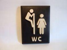 Табличка на двері туалету WC