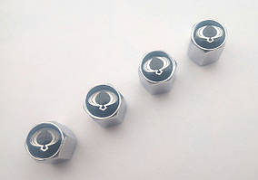 Ковпачки та наклейки для дисків Ssangyong