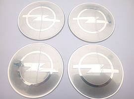 Ковпачки та наклейки для дисків Opel опель