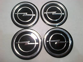 Ковпачки та наклейки для дисків Opel опель