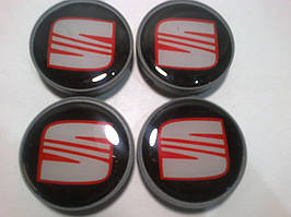 Ковпачки та наклейки для дисків Seat сеат