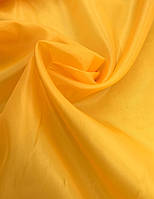 Ткань подкладка жёлтая , (ш.150 см.), 100% полиэстер ,на метраж