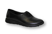 Женские туфли в натуральной коже черного цвета на утолщенной подошве с резинкой спереди