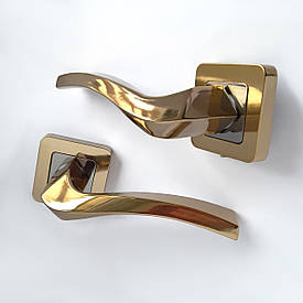 Дверна ручка на розетці 168068071 золото / хром